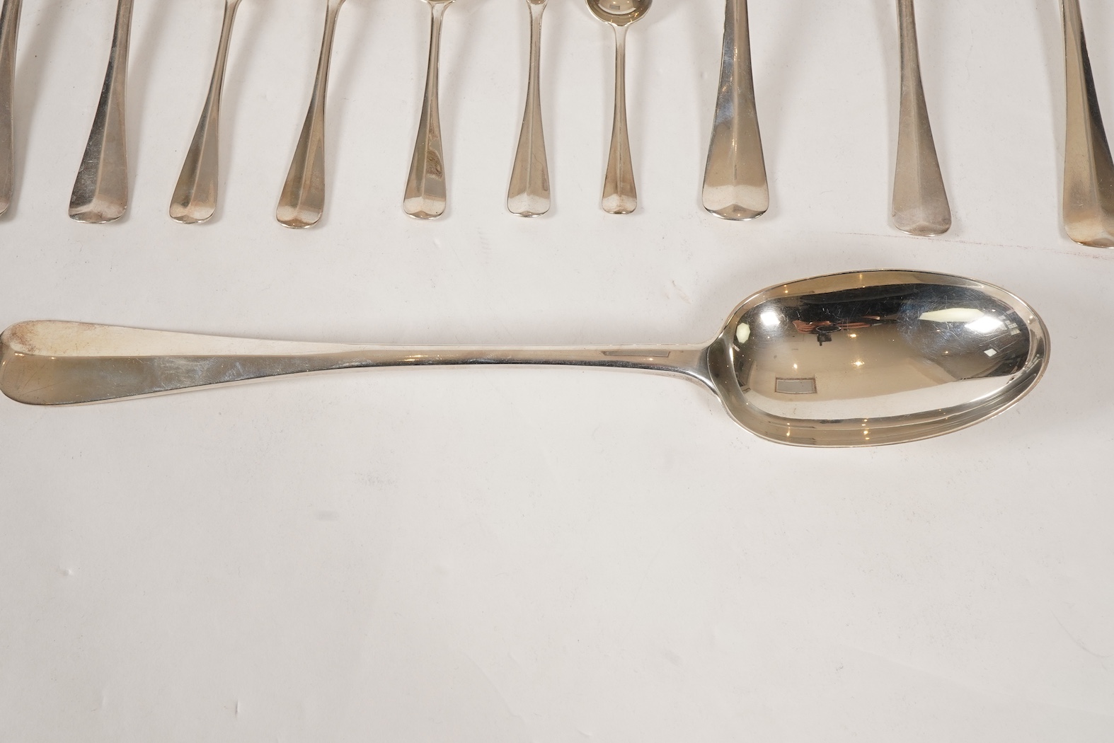A George V canteen of silver Hanoverian rat tail flatware, by Mappin & Webb